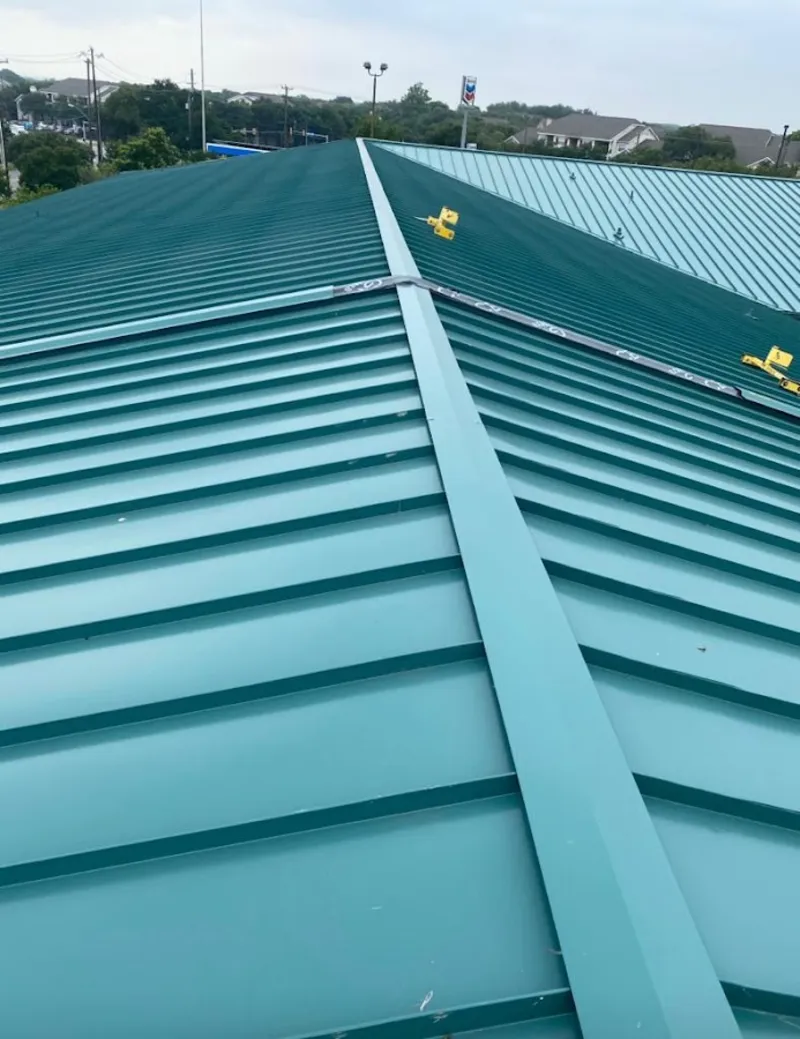 Green commercial metal roof ridge and valley for Metal Roof Repair in South Venice